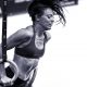 Female CrossFit athlete does a muscle up